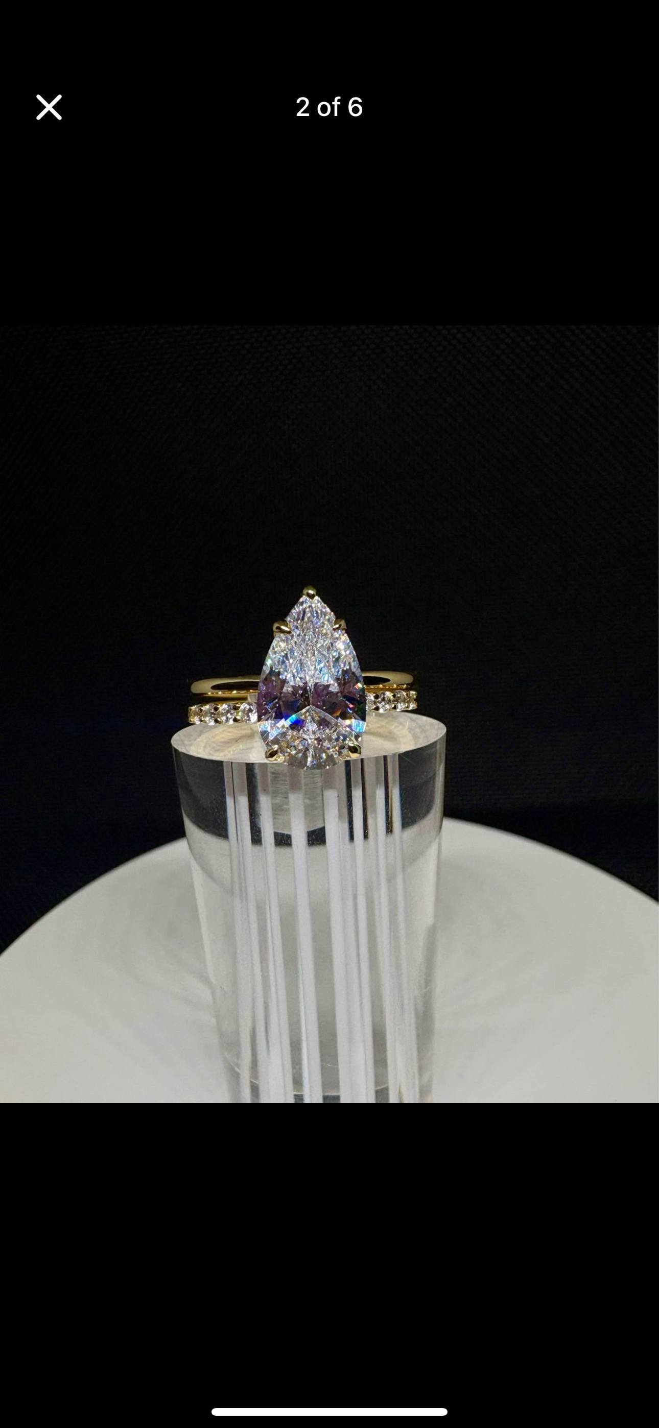 carat pear cut ring with wedding band