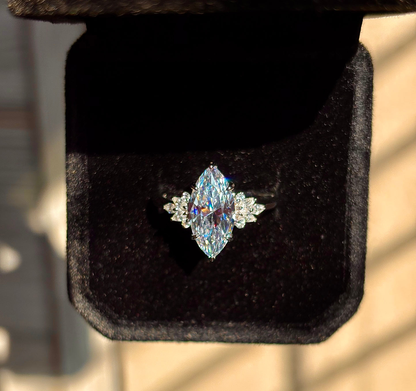 3.0 carat Marquise cut with side stones